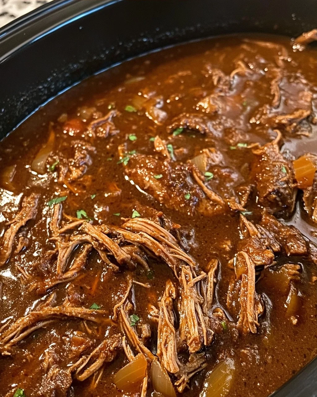 Slow Cooker Shredded Beef in Rich Savory Gravy