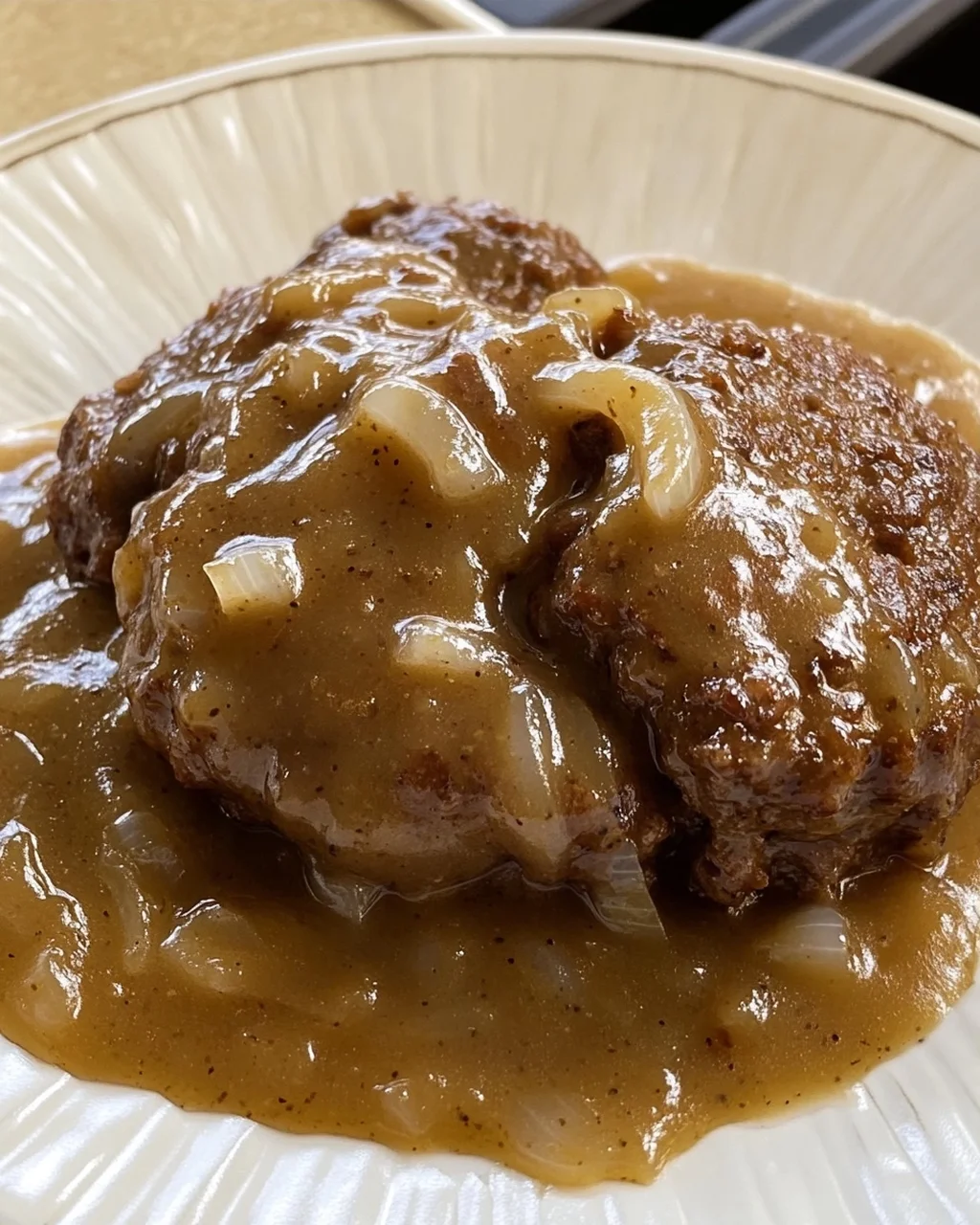 Tender Crockpot Beef Patties with Onion Gravy