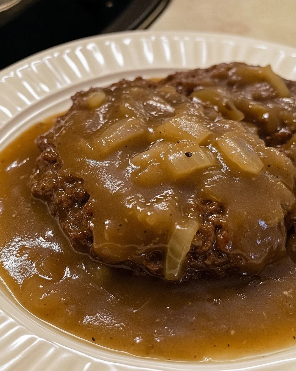 Tender Crockpot Beef Patties with Onion Gravy